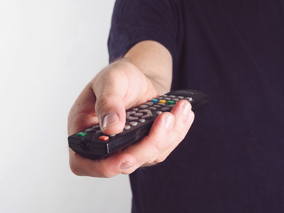 Male-Hand-TV-Remote